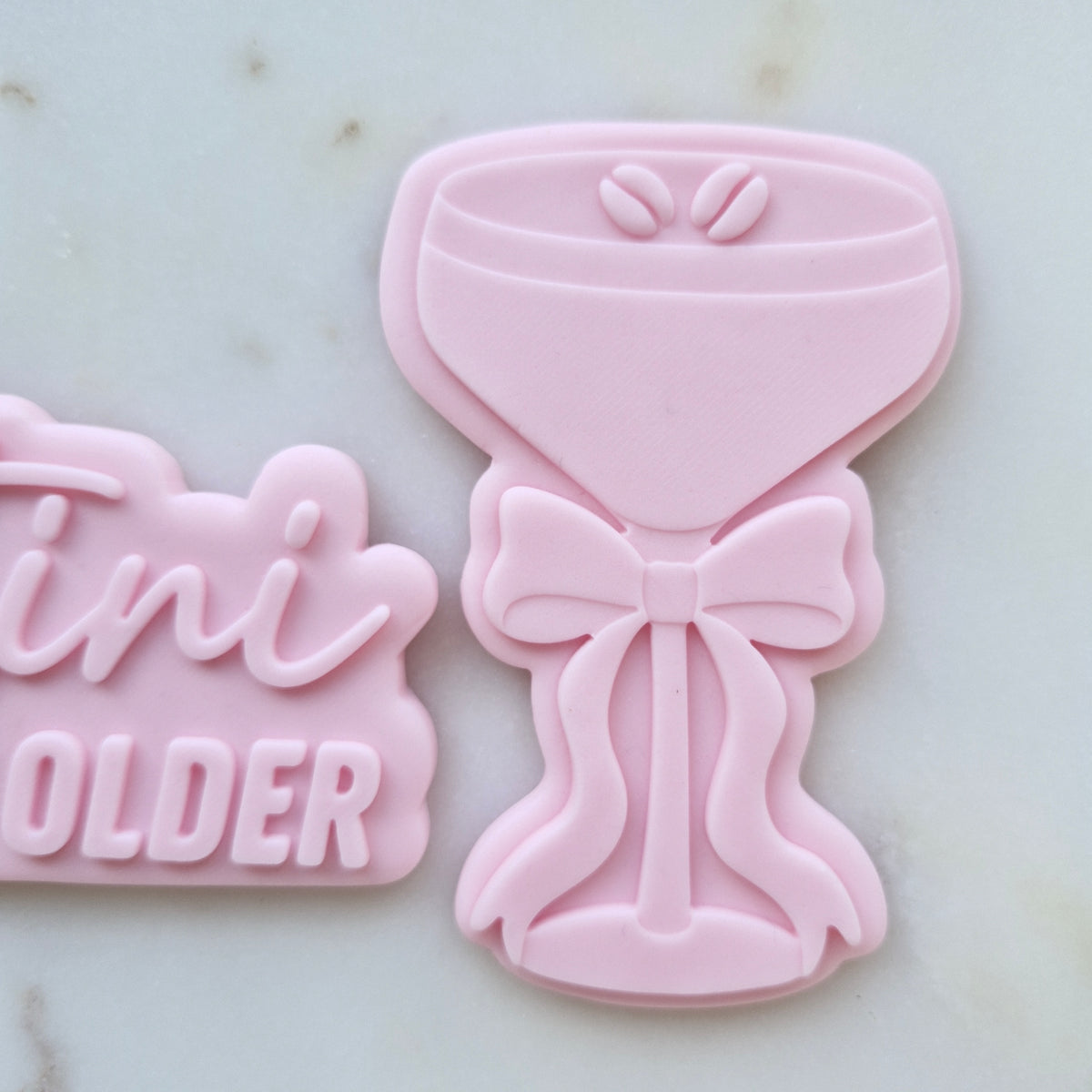 A Tini Bit Older Espresso Martini Set Cookie Cutter and Deboss Stamp zoomed in on the espresso martini glass with bow