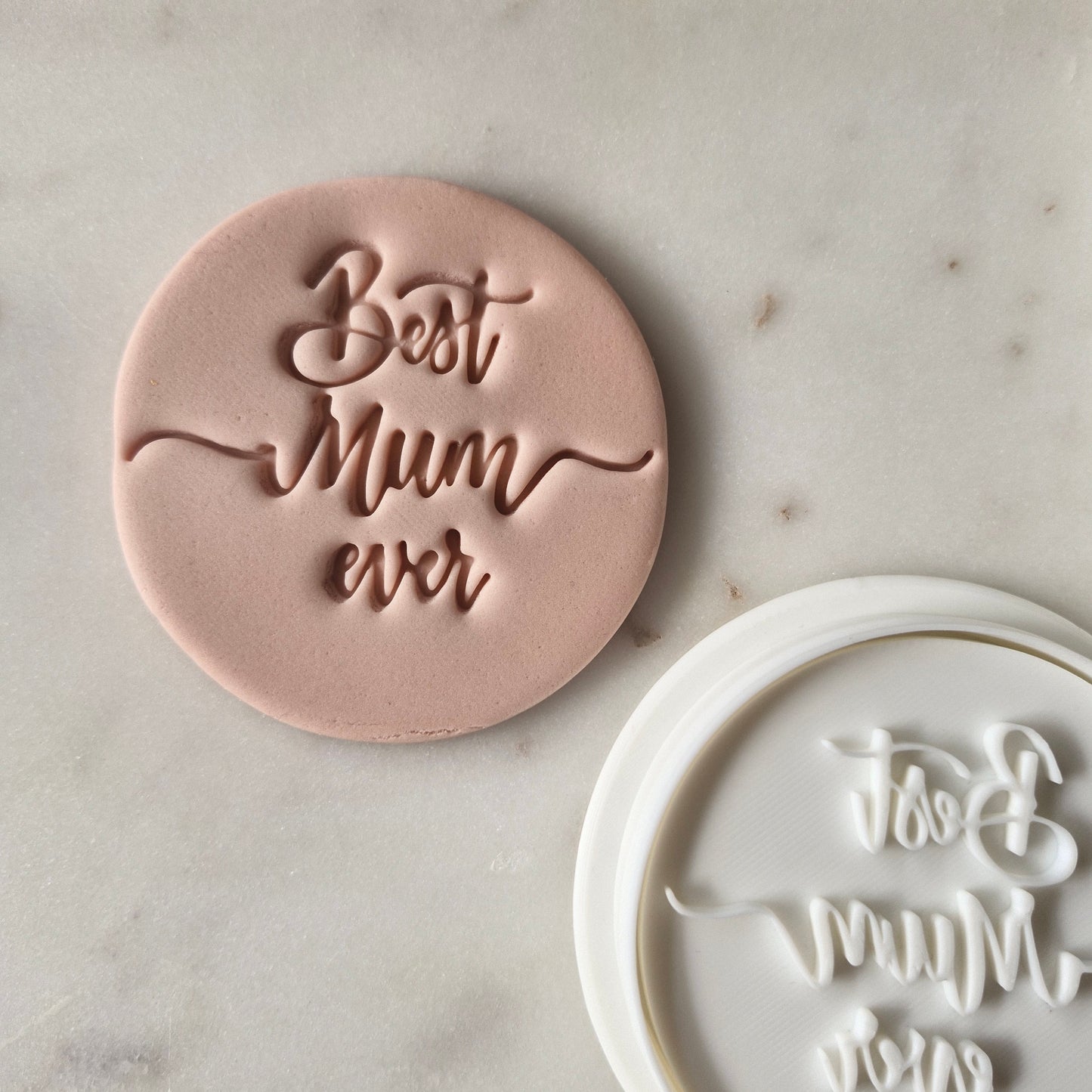 Best Mum Ever Cookie Cutter and Stamp zoomed out on white marble background