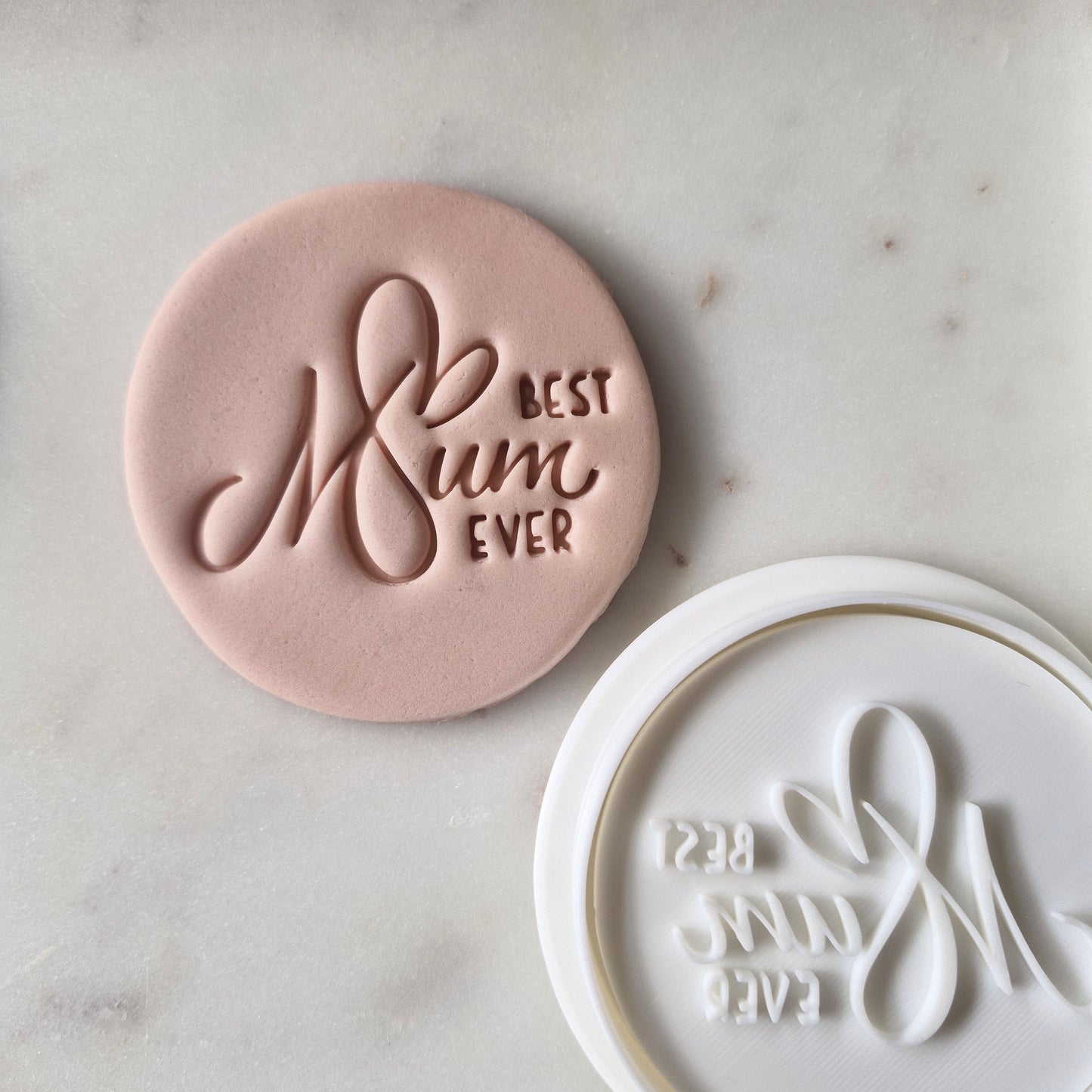 Best Mum Ever with Heart Cookie Cutter and Stamp zoomed out on white marble