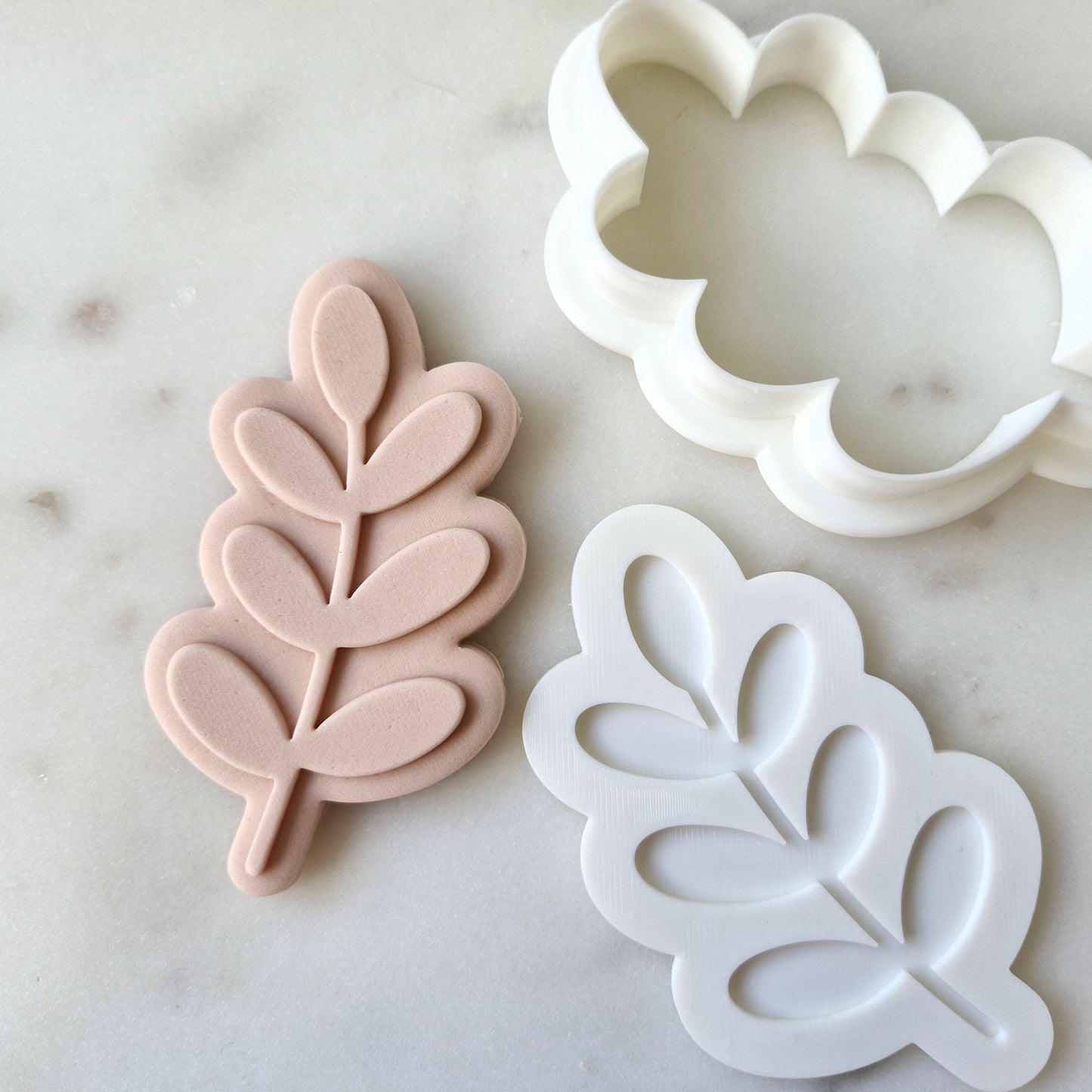 zoomed out on white marble background Botanical Leaf Cookie Cutter and Stamp
