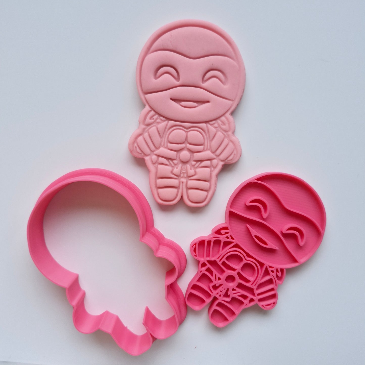 pink fondant, cookie cutter and stamp, in the shape of turtle dressed as a ninja