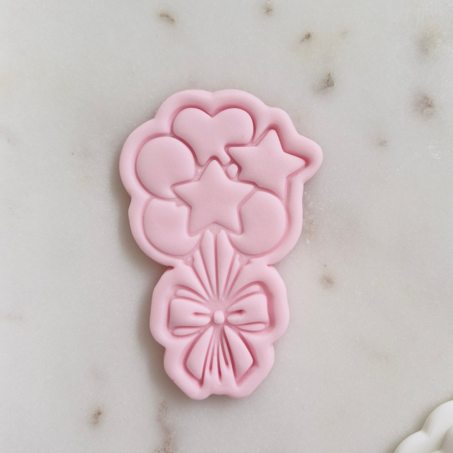 Balloons with Bow Cookie Cutter and Stamp zoomed in