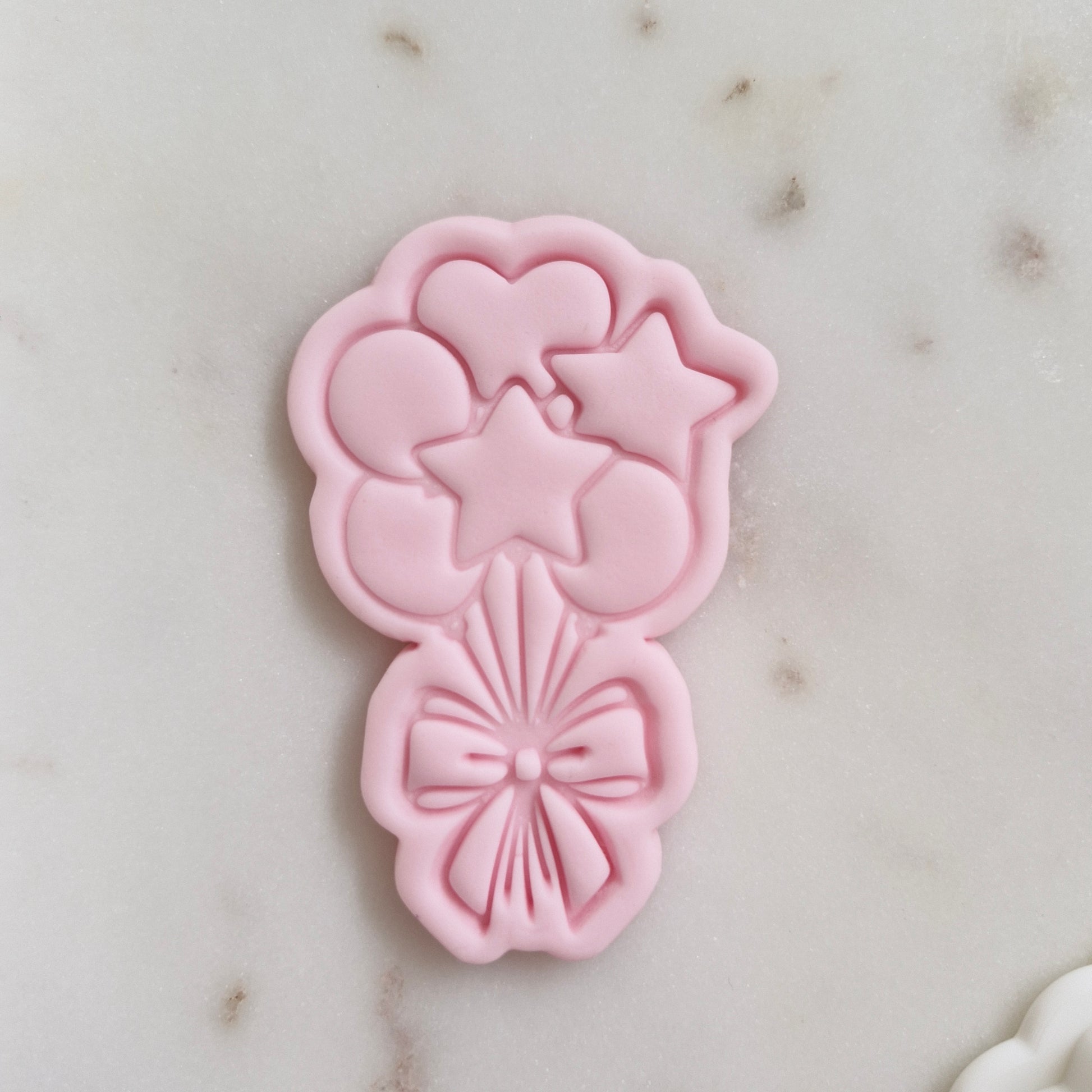 Balloons with Bow Cookie Cutter and Stamp zoomed in