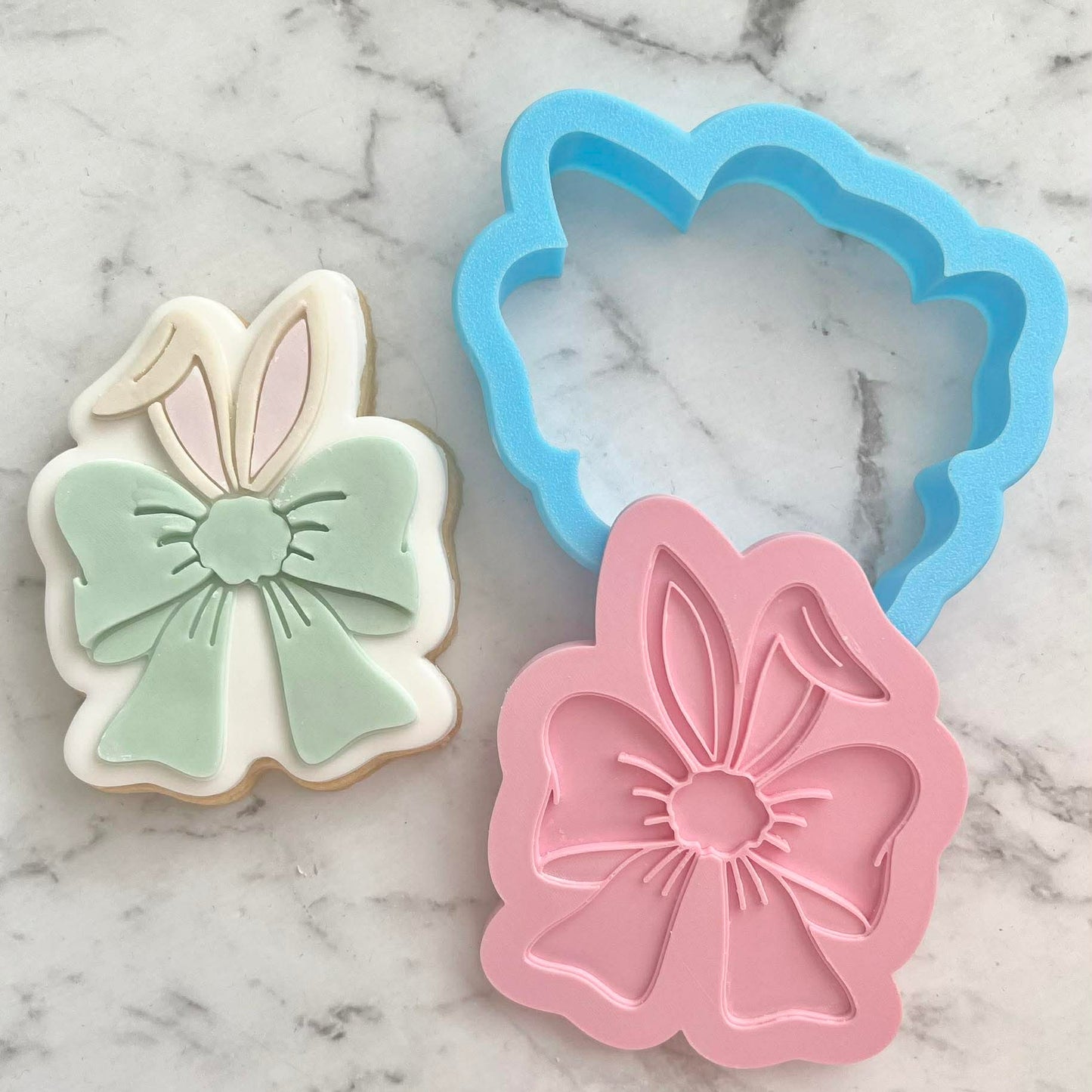 Bunny Ears With Bow Cookie Cutter and Deboss Stamp - Baking Tool, on white marble