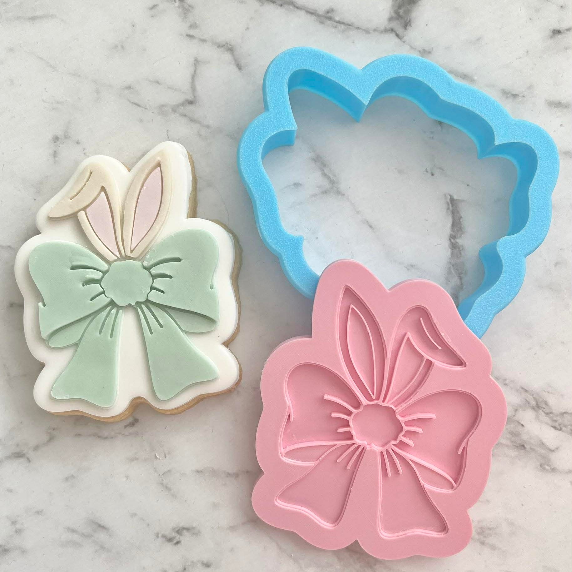 Bunny Ears With Bow Cookie Cutter and Deboss Stamp - Baking Tool, on white marble