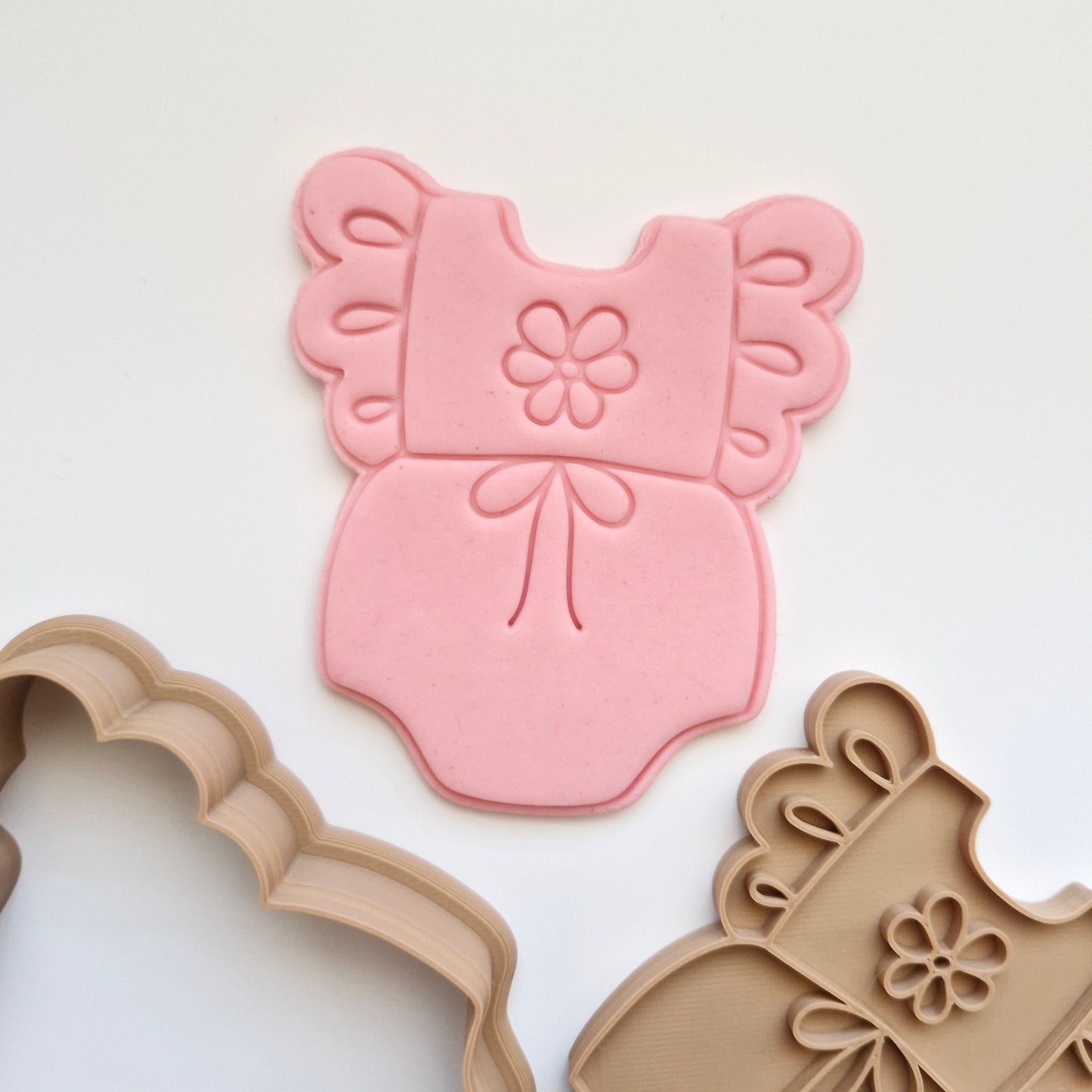 Floral Baby Onesie Cookie Cutter and Stamp zoomed in on white background