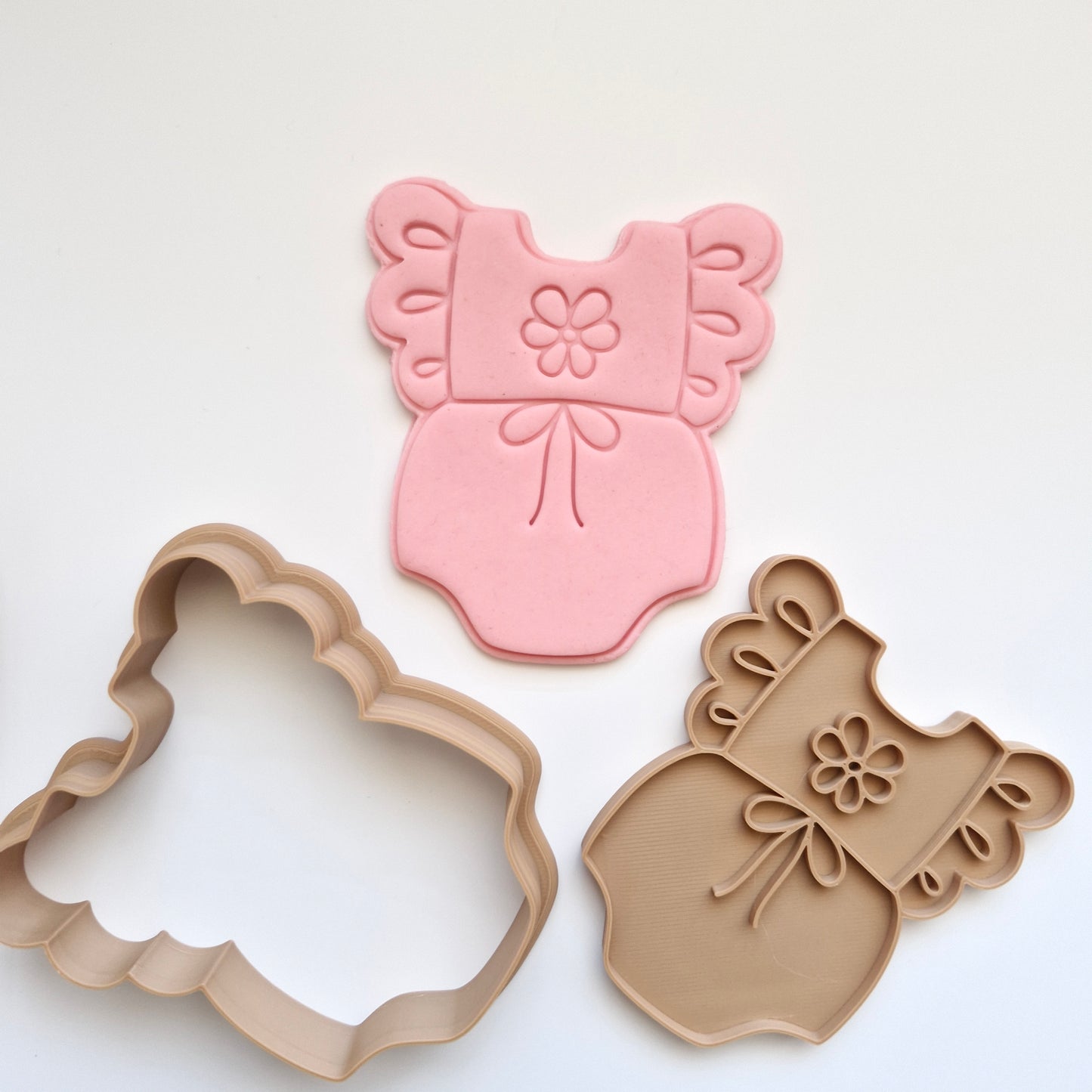 Floral Baby Onesie Cookie Cutter and Stamp zoomed out on white bakground