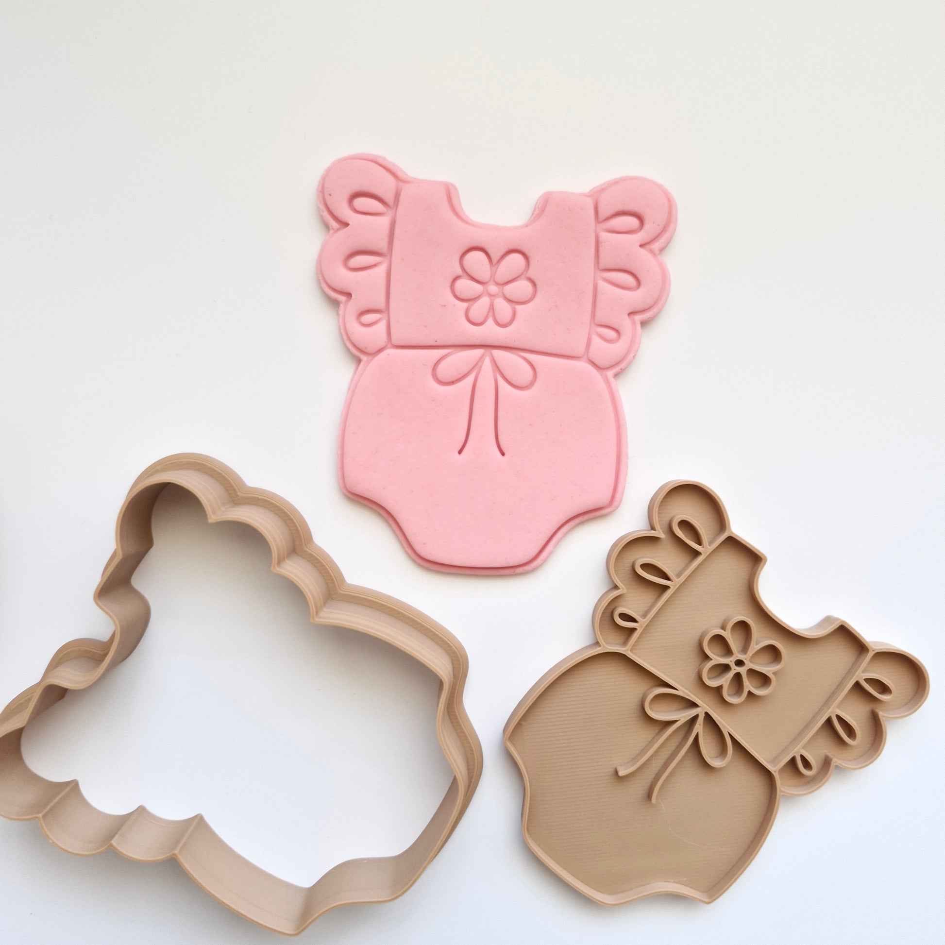 Floral Baby Onesie Cookie Cutter and Stamp zoomed out on white bakground
