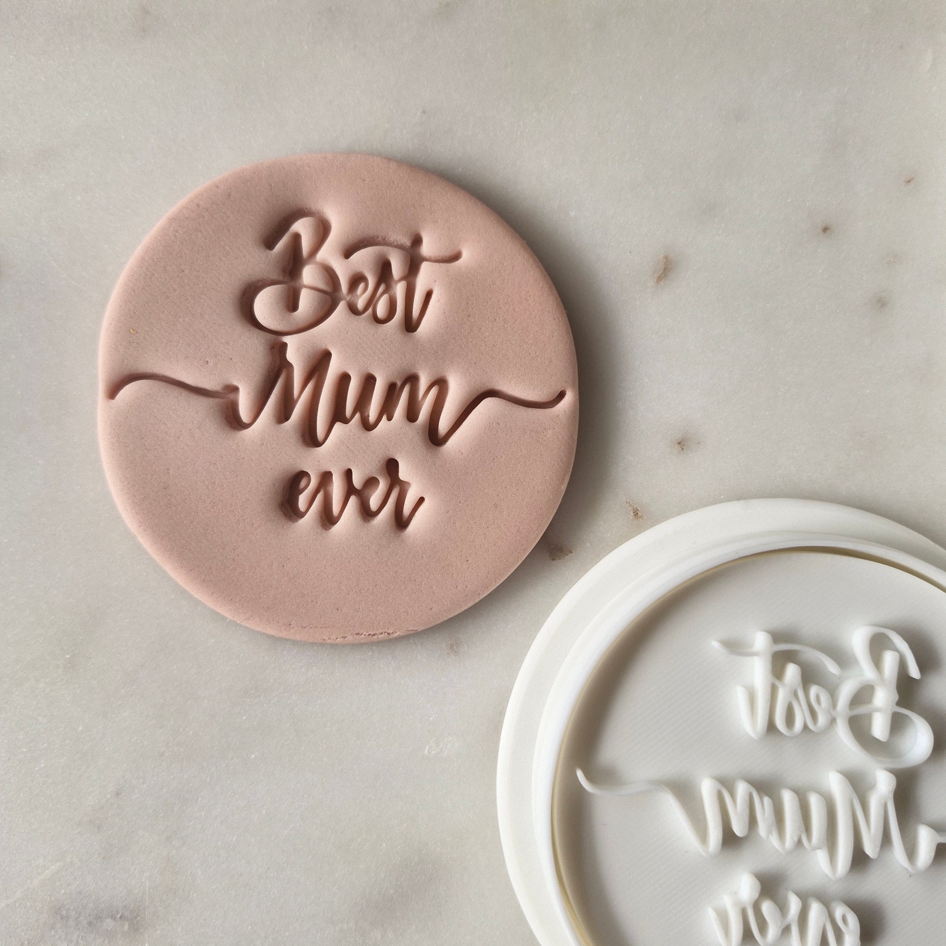 Best Mum Ever Cookie Cutter and Stamp zoomed out on white marble background