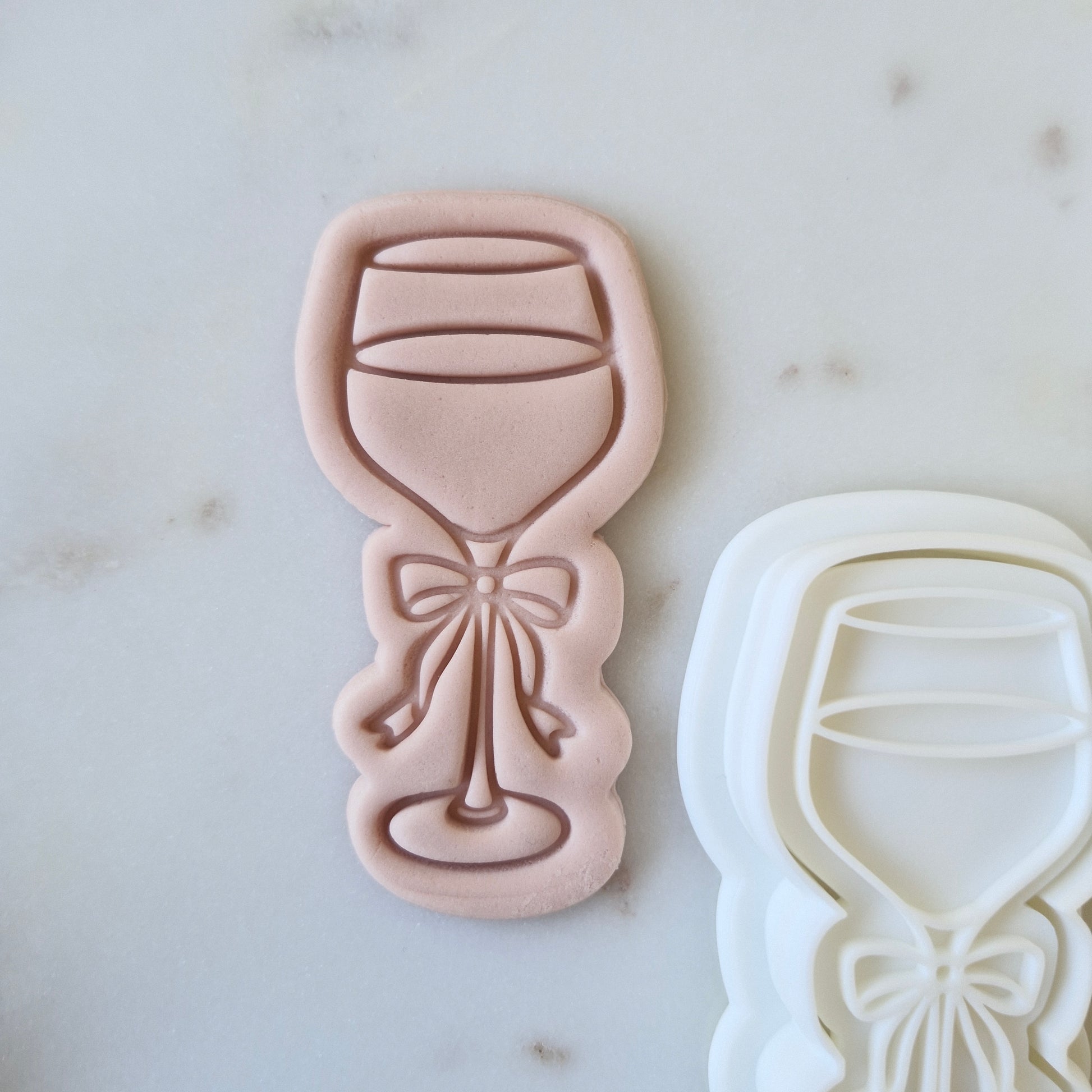 Champagne Glass with Bow Cookie Cutter and Stamp zoomed in