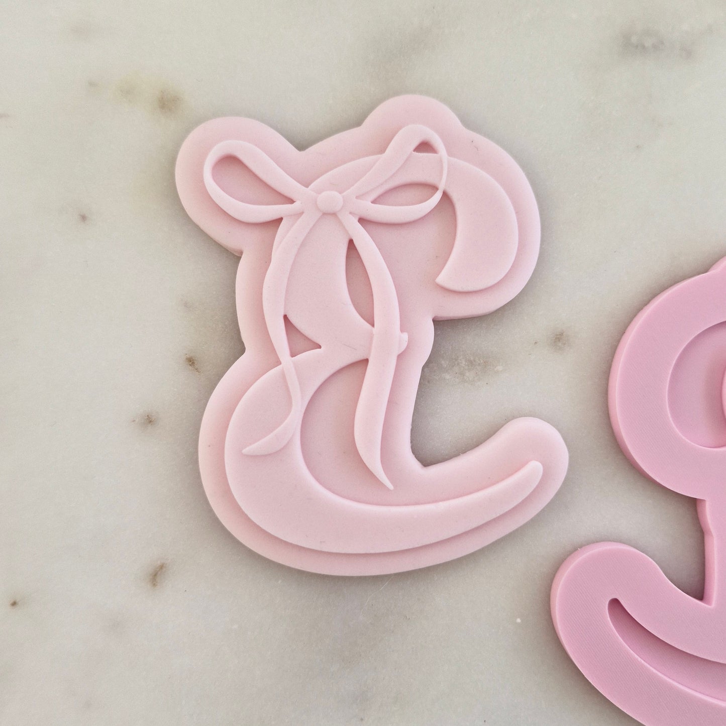 Letter E with Bow Cookie Cuter and Stamp zoomed in