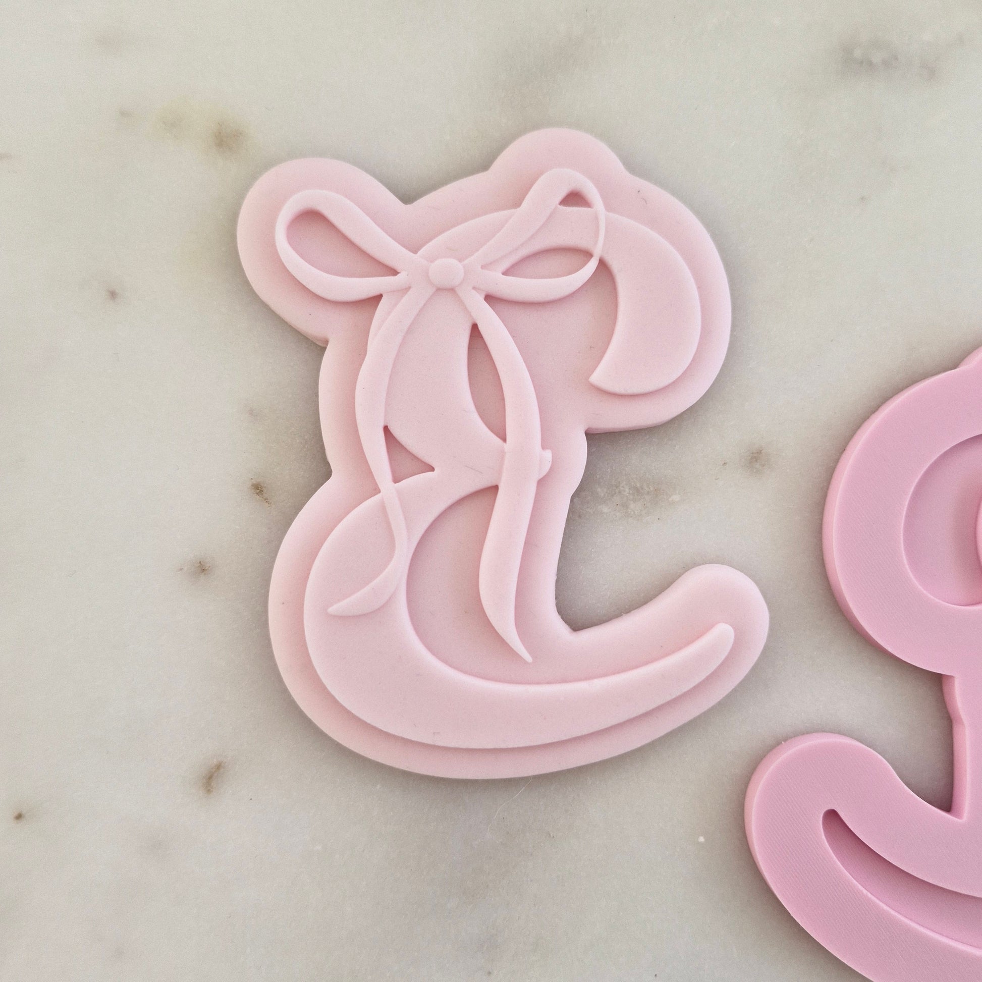 Letter E with Bow Cookie Cuter and Stamp zoomed in