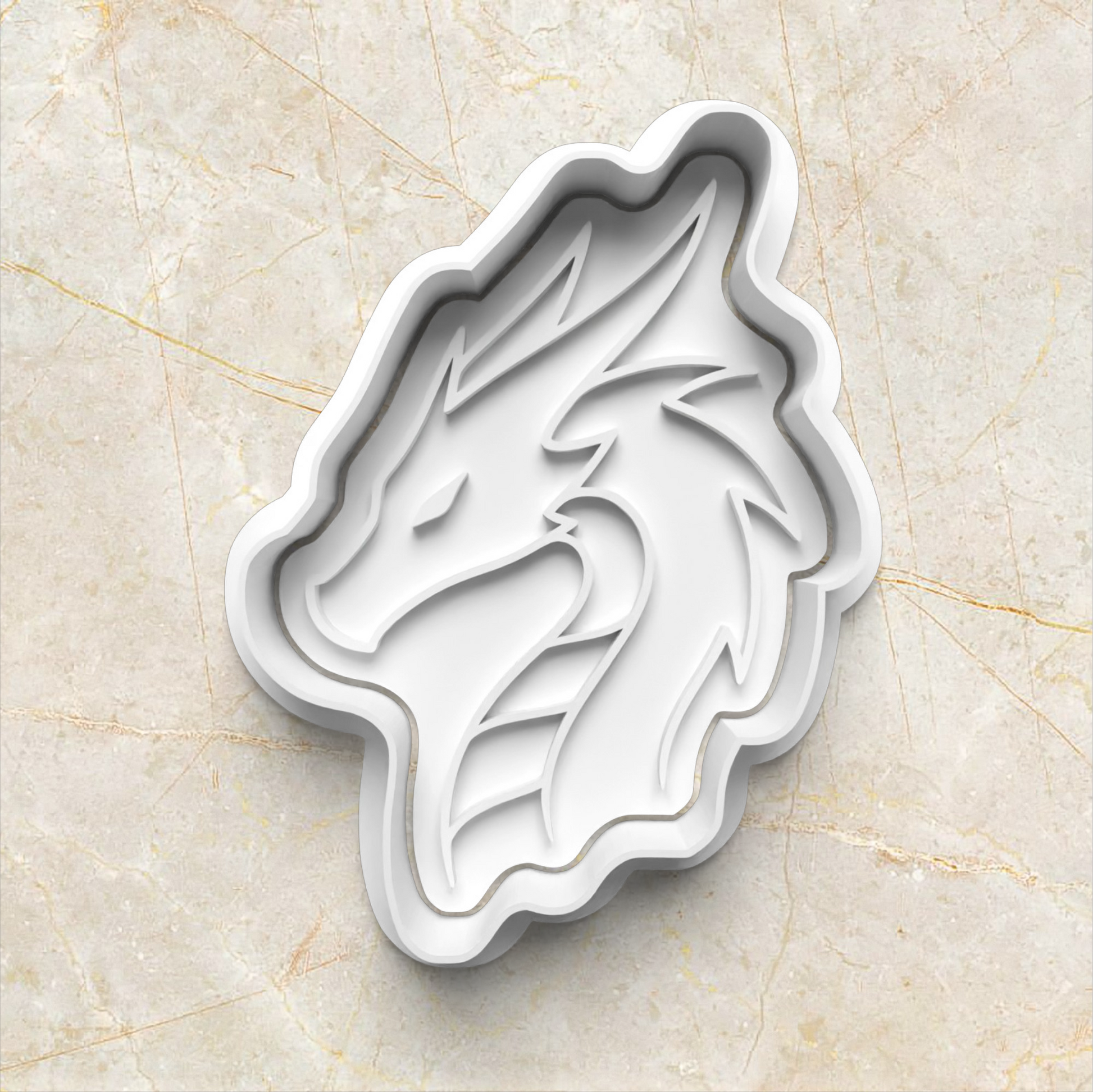white dragon-shaped cookie cutter on a beige marble surface Dragon Set Cookie Cutter and Stamp