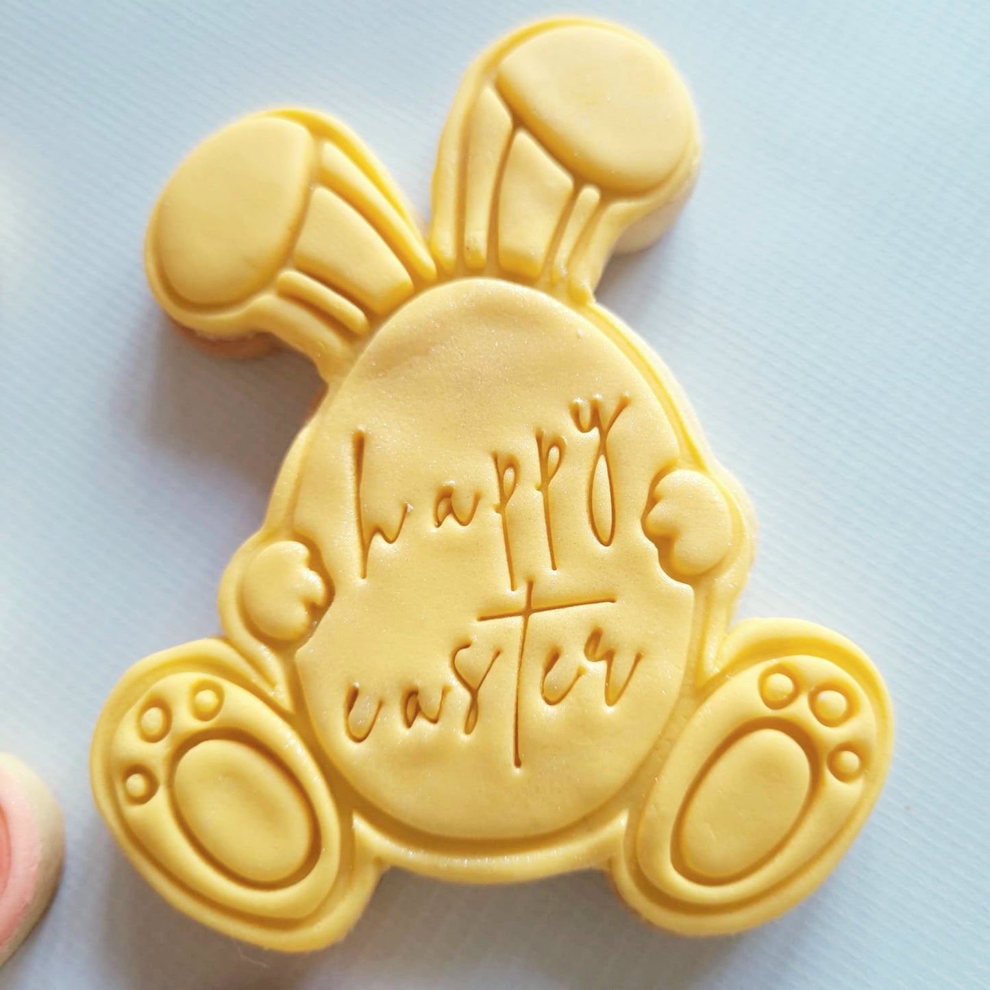 sugar cookie bunny name tag holding egg easter theme yellow cookie with writing happy easter on it Bunny Name Tag Cookie Cutter and Stamp