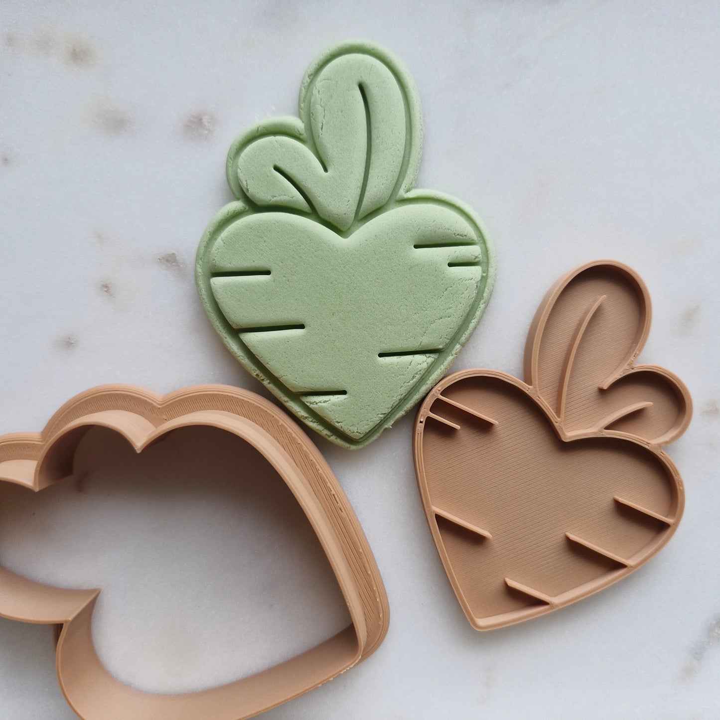 Heart Carrot Cookie Cutter and Emboss Stamp - Baking Tool zoomed out on marble background