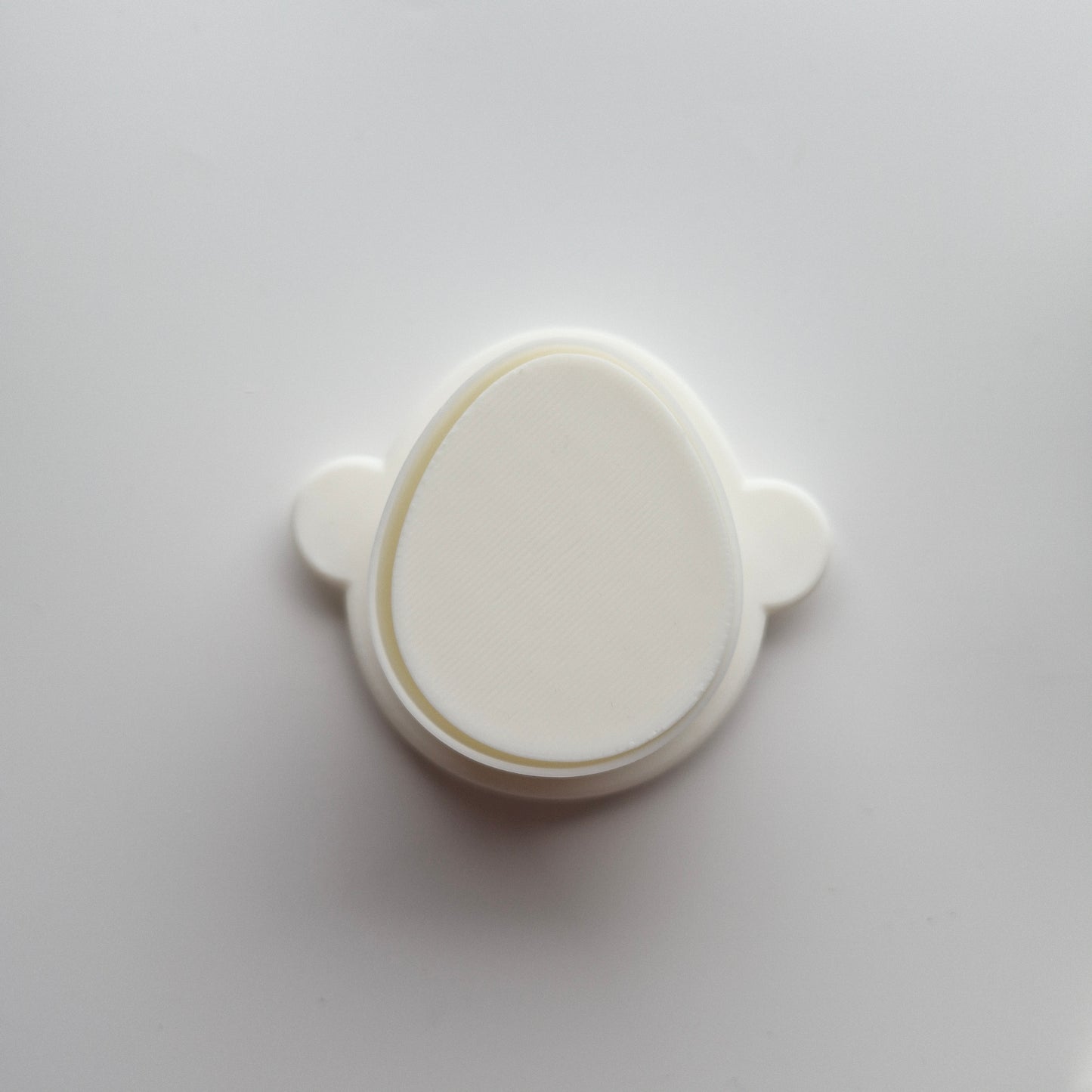 Egg Cake Pop Mould zoomed in on egg on white background