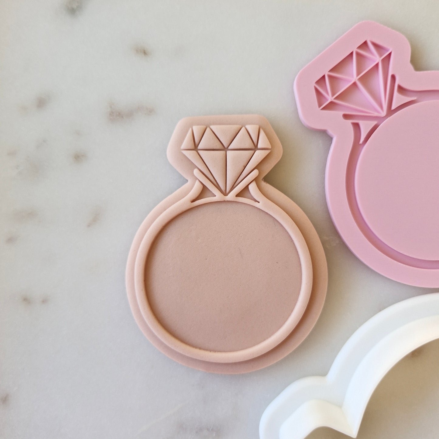 Engagement Ring Cookie Cutter and Stamp zoomed in on marble stone