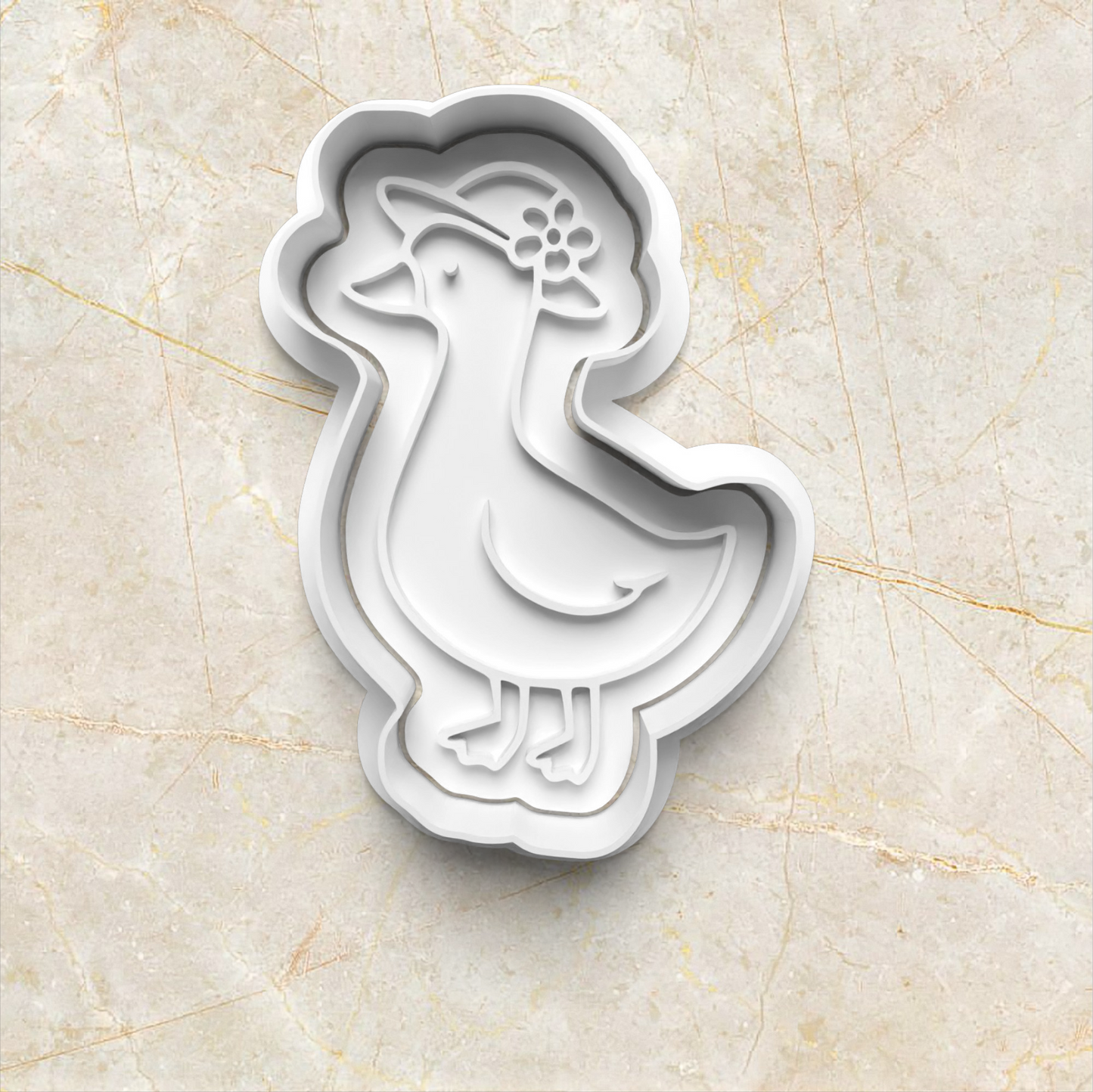 One Silly Goose Cookie Cutter and Emboss Stamp - Baking Tool, standing goose with hat, on yellow marble