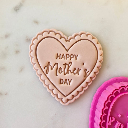 Happy Mother's Day Heart Cookie Cutter and Stamp zoomed in on white marble stone