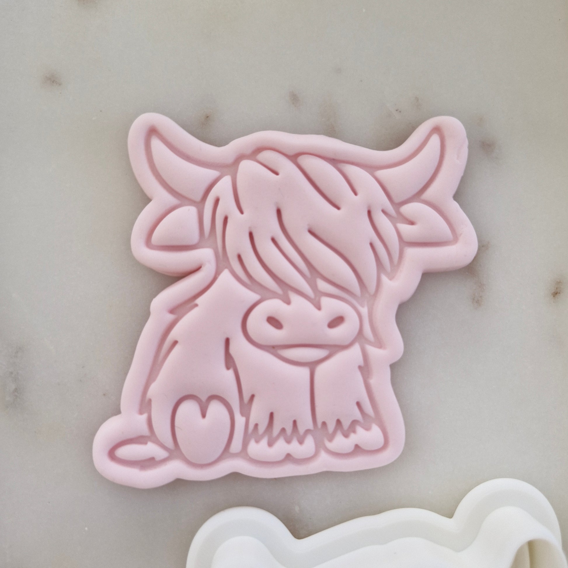 Sitting Highland Cow Cookie Cutter and Stamp zoomed in