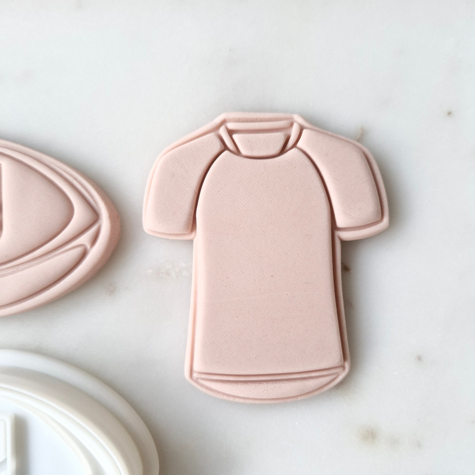 Footy and Jersey Cookie Cutter and Stamp zoomed in on the jersey Football and Jersey Cookie Cutter and Stamp Baking tool