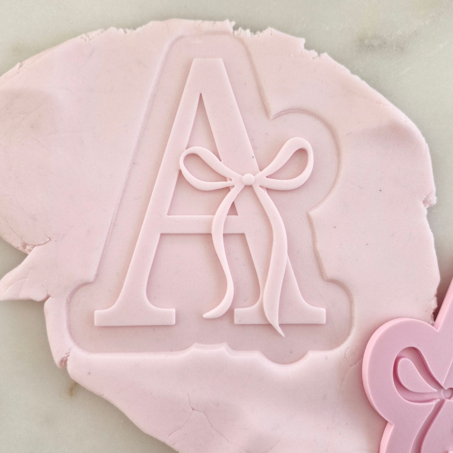 Letter A with Bow Cookie Cutter and Stamp zoomed in