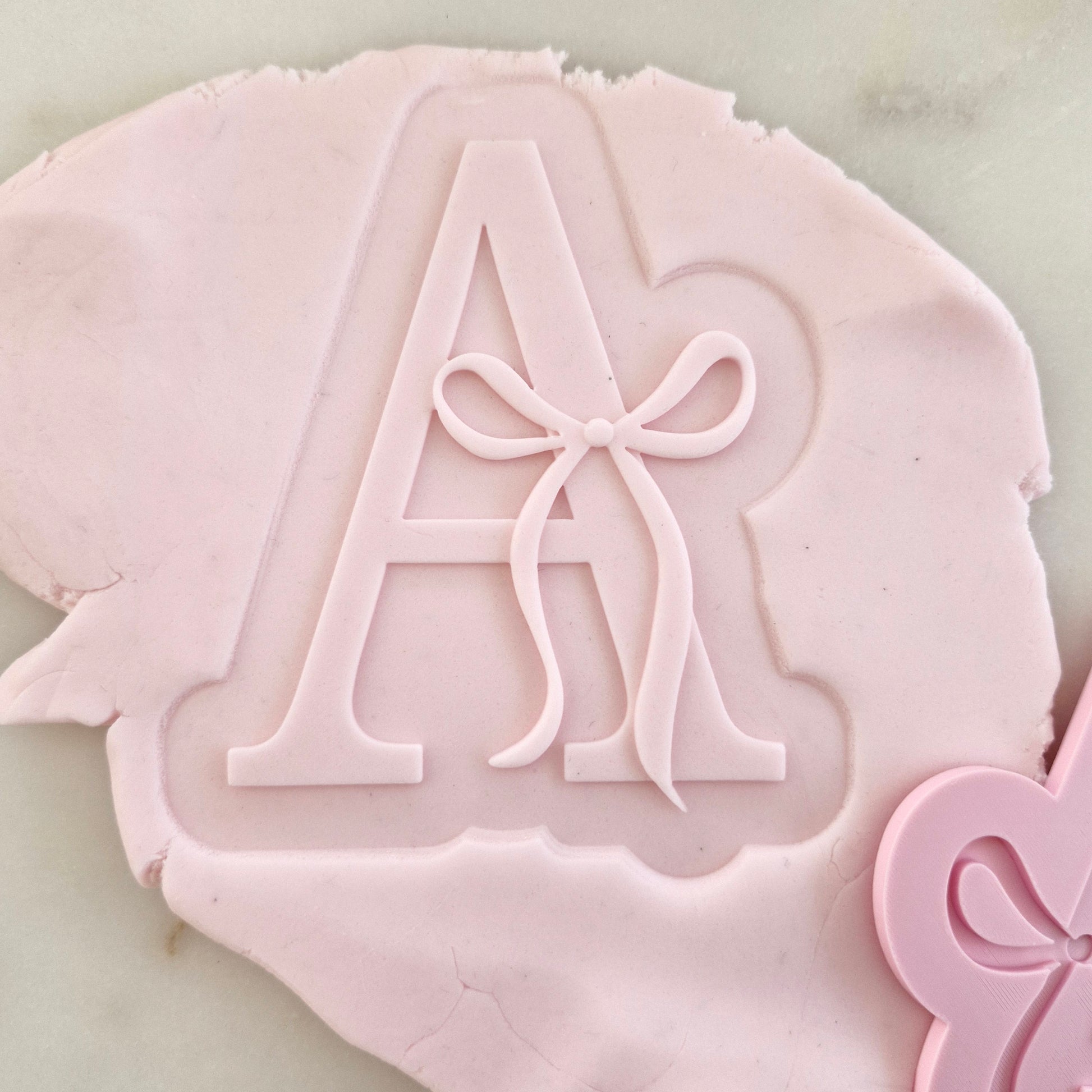 Letter A with Bow Cookie Cutter and Stamp zoomed in