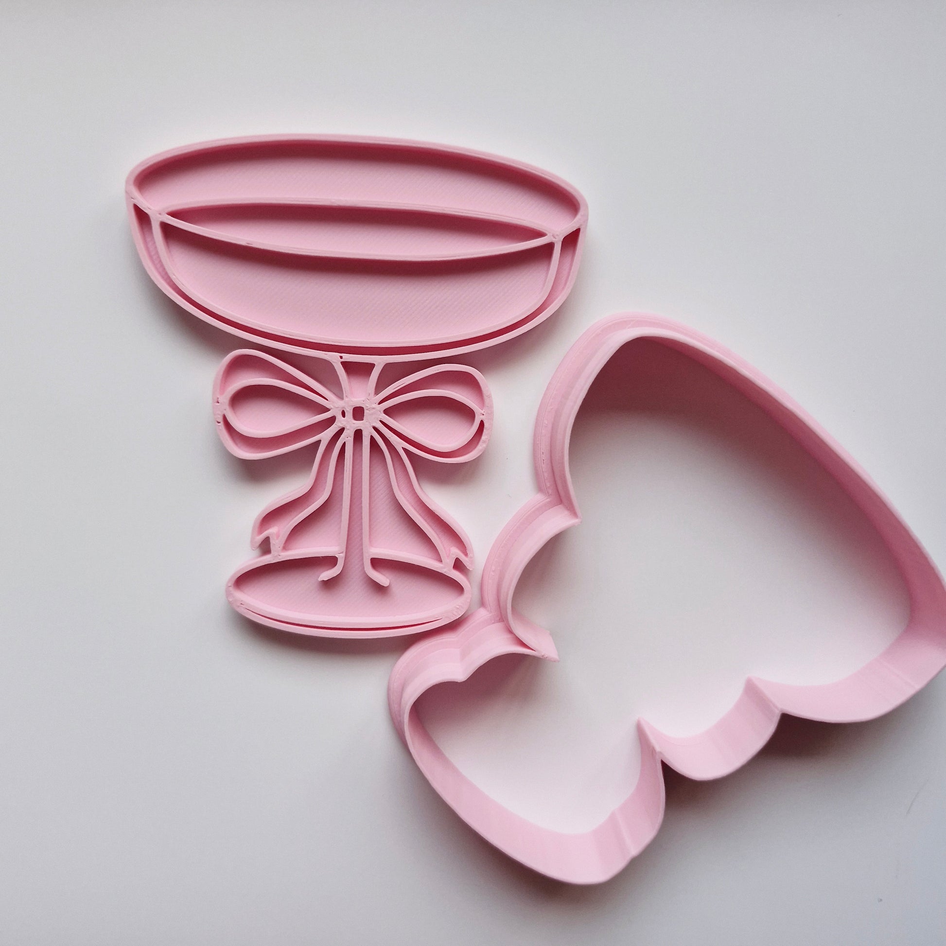cookie stamp and cutter in the shape of martini glass with bow on white background Martini Glass with Bow Cookie Cutter and Stamp