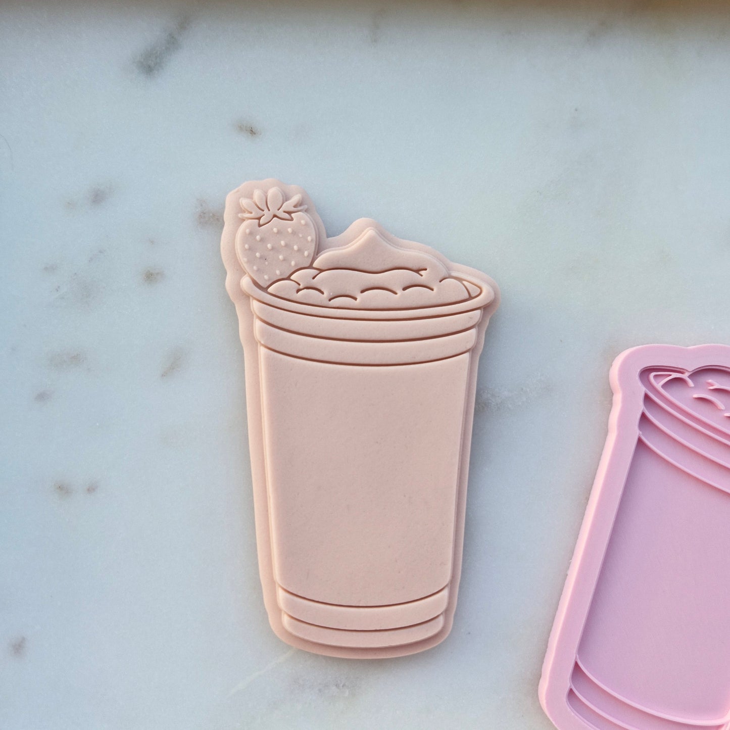 Strawberry Drink Cookie cutter and Stamp zoomed in on marble stone