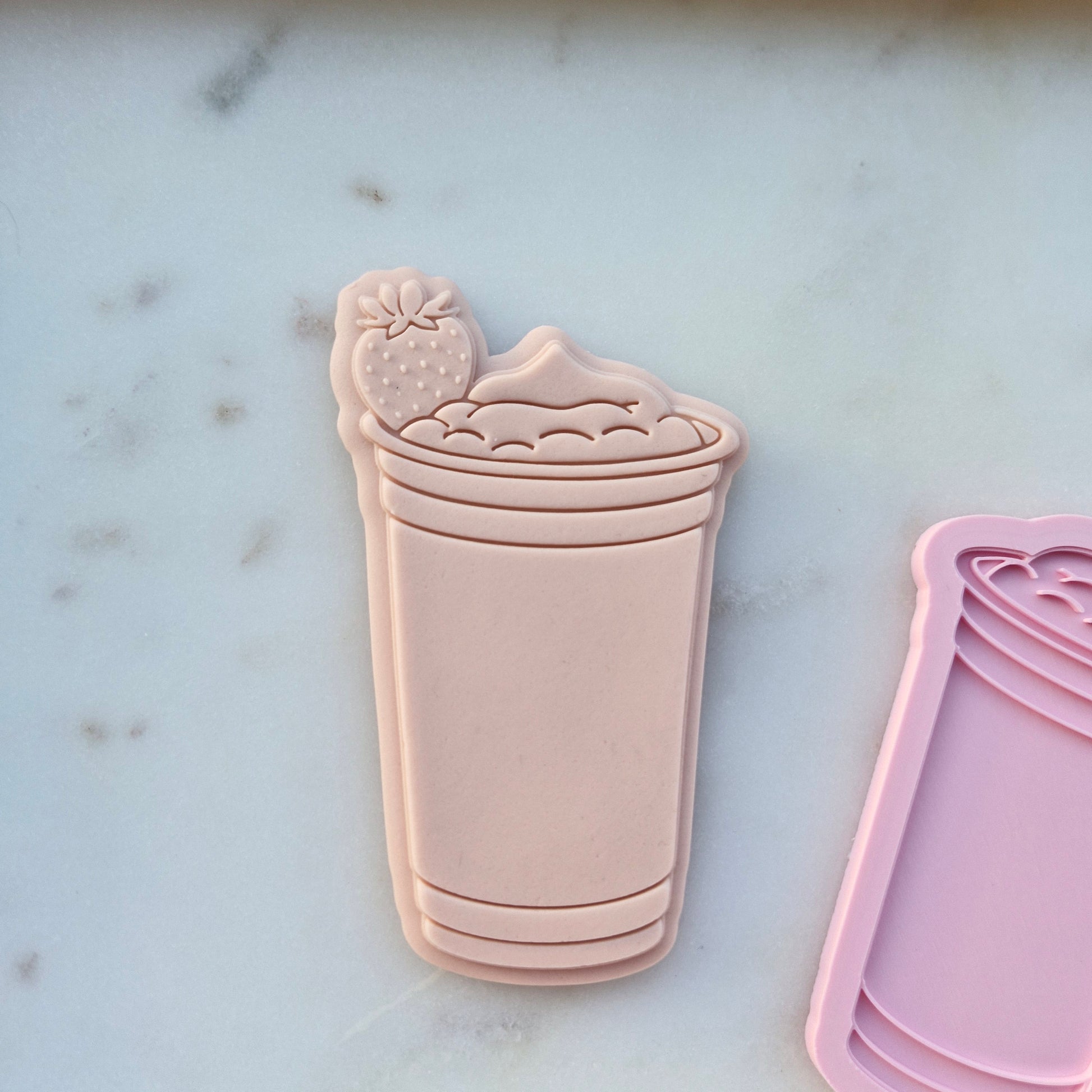 Strawberry Drink Cookie cutter and Stamp zoomed in on marble stone