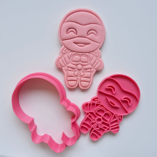 pink fondant, cookie cutter and stamp, in the shape of turtle dressed as a ninja