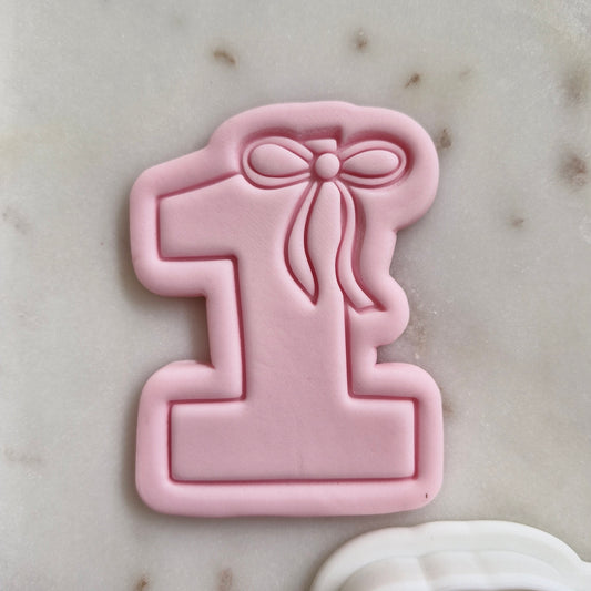 Number One with Bow on Top Cookie Cutter and Stamp zoomed in 