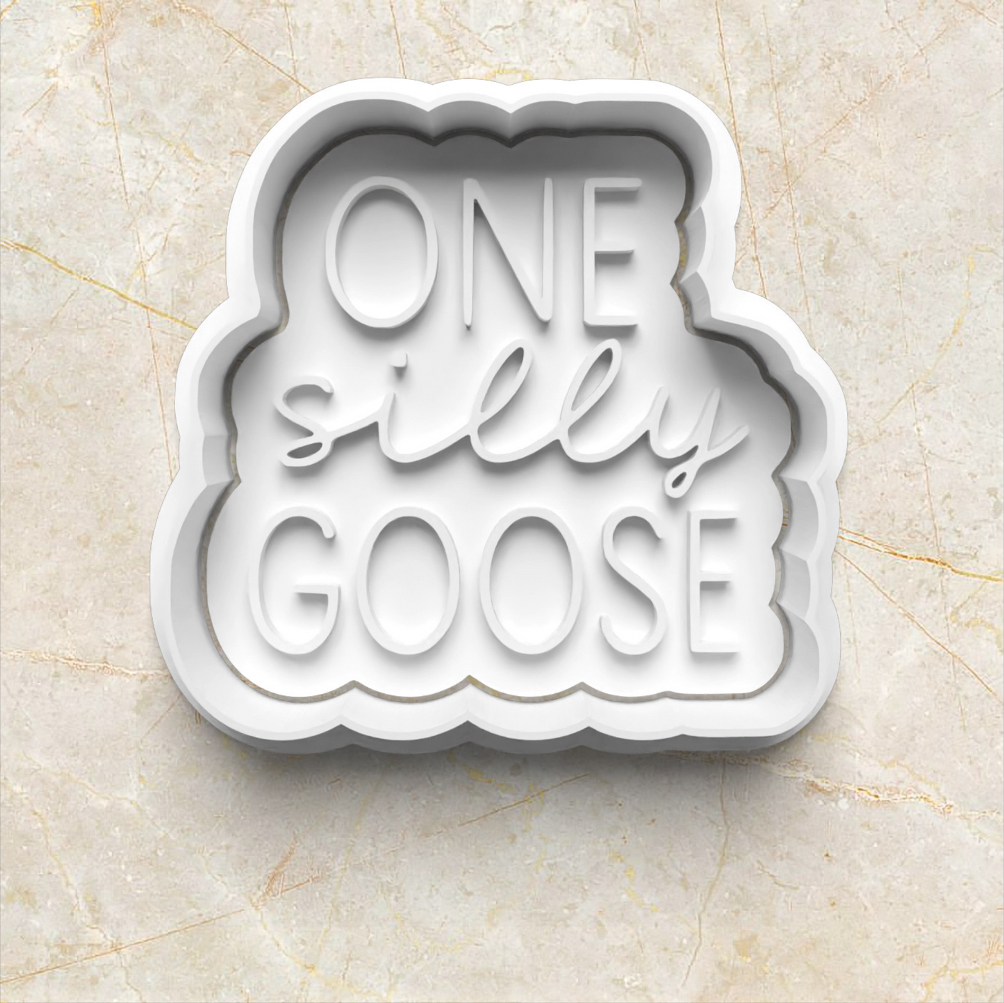 One Silly Goose Cookie Cutter and Emboss Stamp - Baking Tool, one silly goose word stamp and cutter, on yellow marble