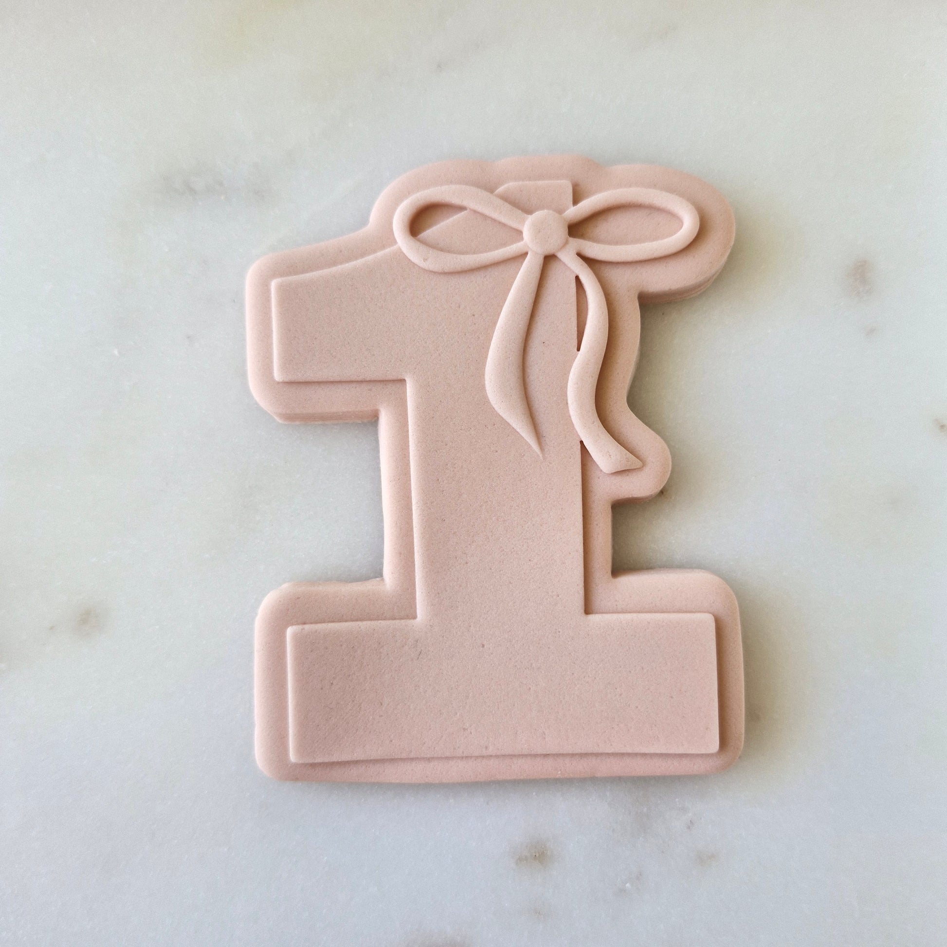 One With Bow On Top Cookie Cutter and Stamp zoomed in