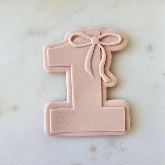 One With Bow On Top Cookie Cutter and Stamp zoomed in