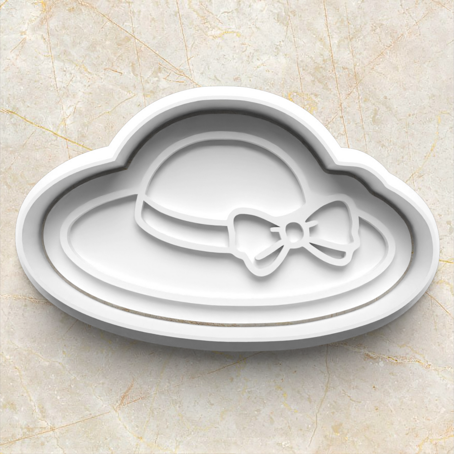 Cookie cutter and stamp in the shape of a white hat, on beige marble background. Picnic Cookie Cutter and Emboss Stamp