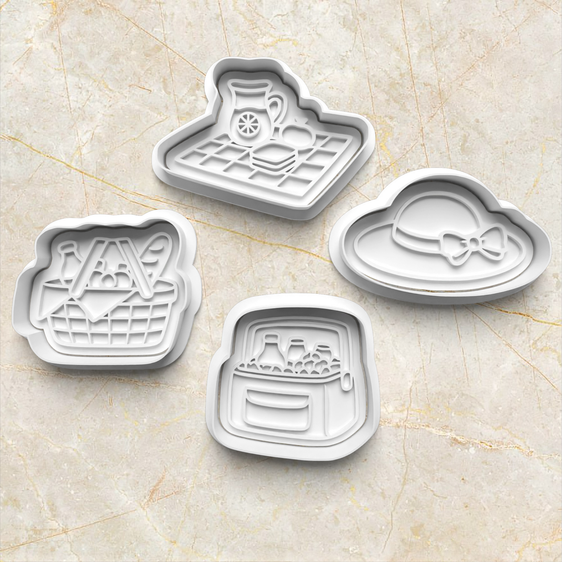 Four cookie cutters with different designs of a picnic theme on a marble surface Picnic Cookie Cutter and Emboss Stamp