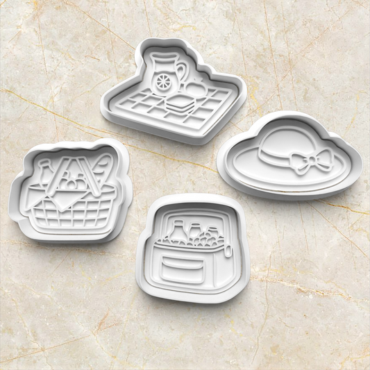 Four cookie cutters with different designs of a picnic theme on a marble surface Picnic Cookie Cutter and Emboss Stamp