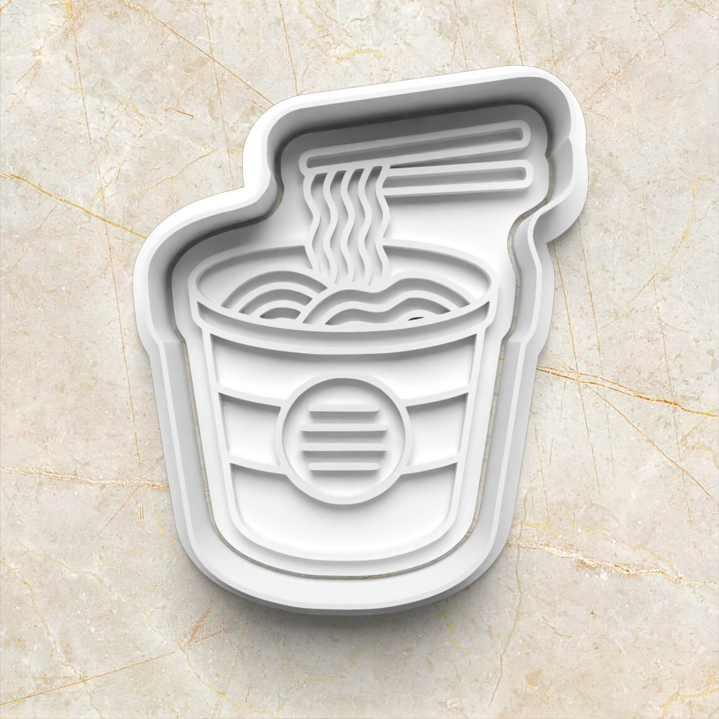 White cookie cutter shaped like a cup of ramen noodles on a beige marble surface Ramen Noodles Cookie Cutter and Stamp