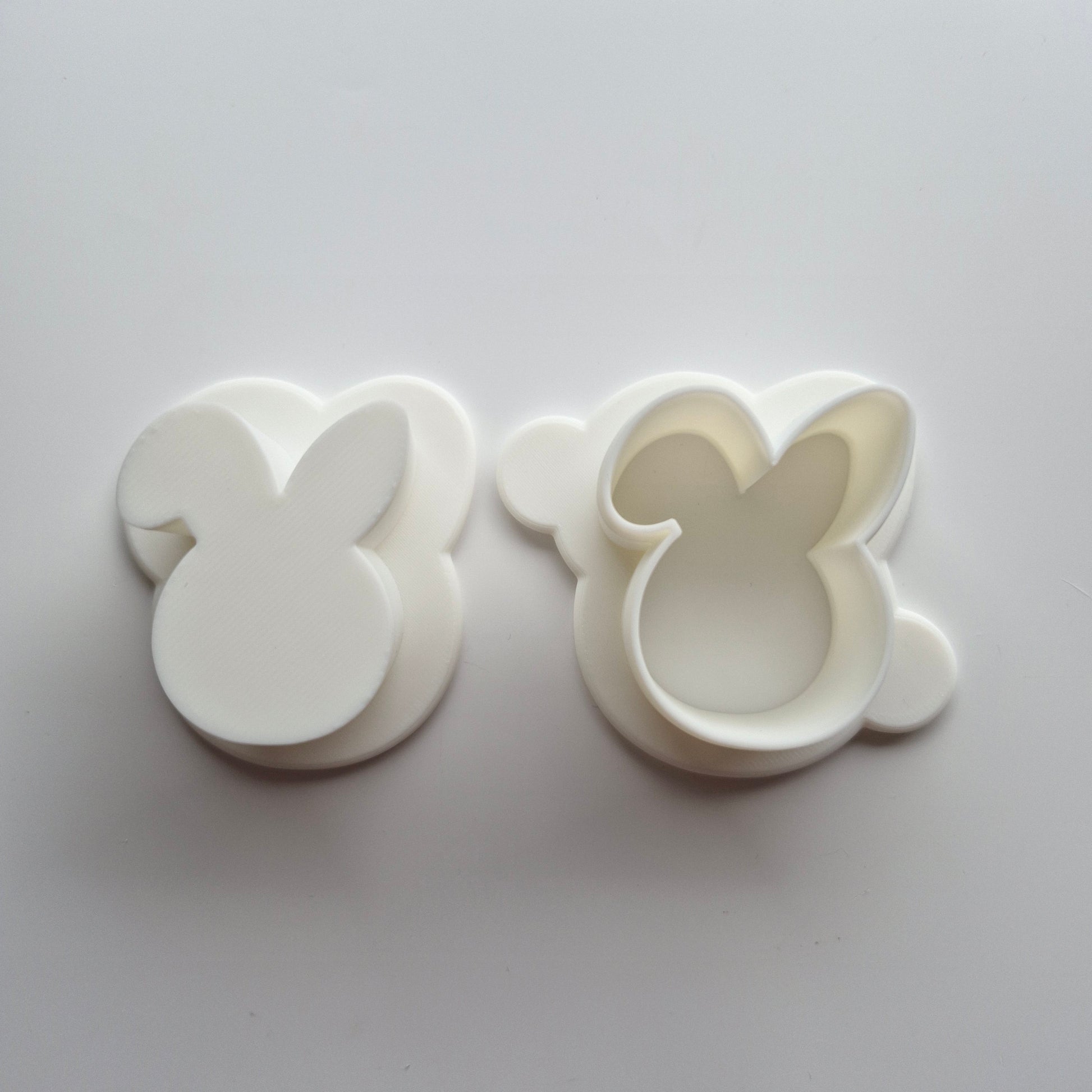 Bunny Head Cake Pop Mould showing separate cake pop cutter and push on white background
