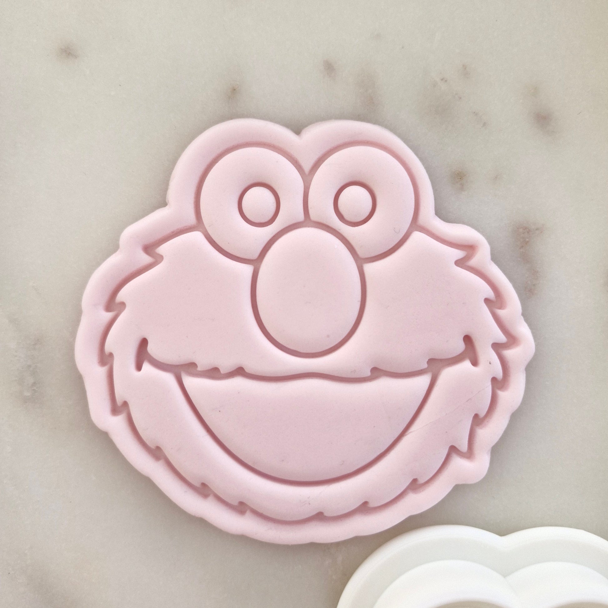 Red Fluffy Monster Head Cookie Cutter and Stamp zoomed in 