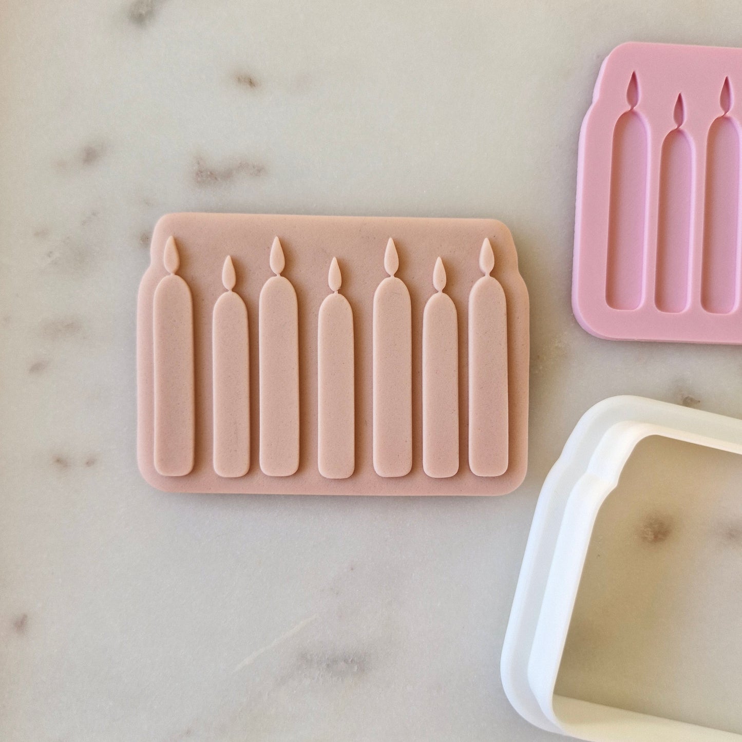 Birthday Candles Cookie Cutter and Stamp zoomed out on white marble