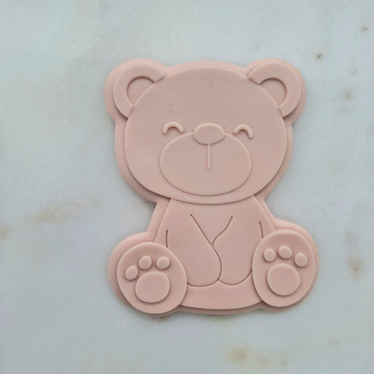 Sitting Bear Cookie Cutter and Stamp - Baking Tool zoomed in on white marble stone