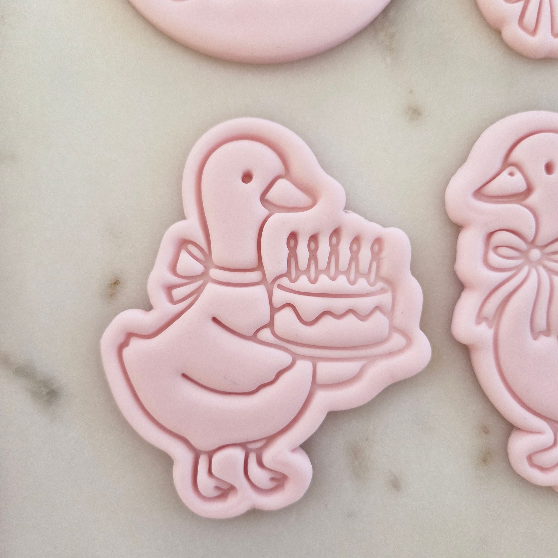 One Silly Goose Set Cookie Cutter and Stamp goose with cake