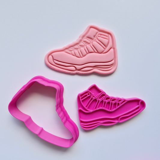 pink and cookie cutter stamp with pink fondant in the shape of sneakers. Activewear Outfit Set Cookie Cutter and Stamp. Athletic Shoes Cookie Cutter and Stamp