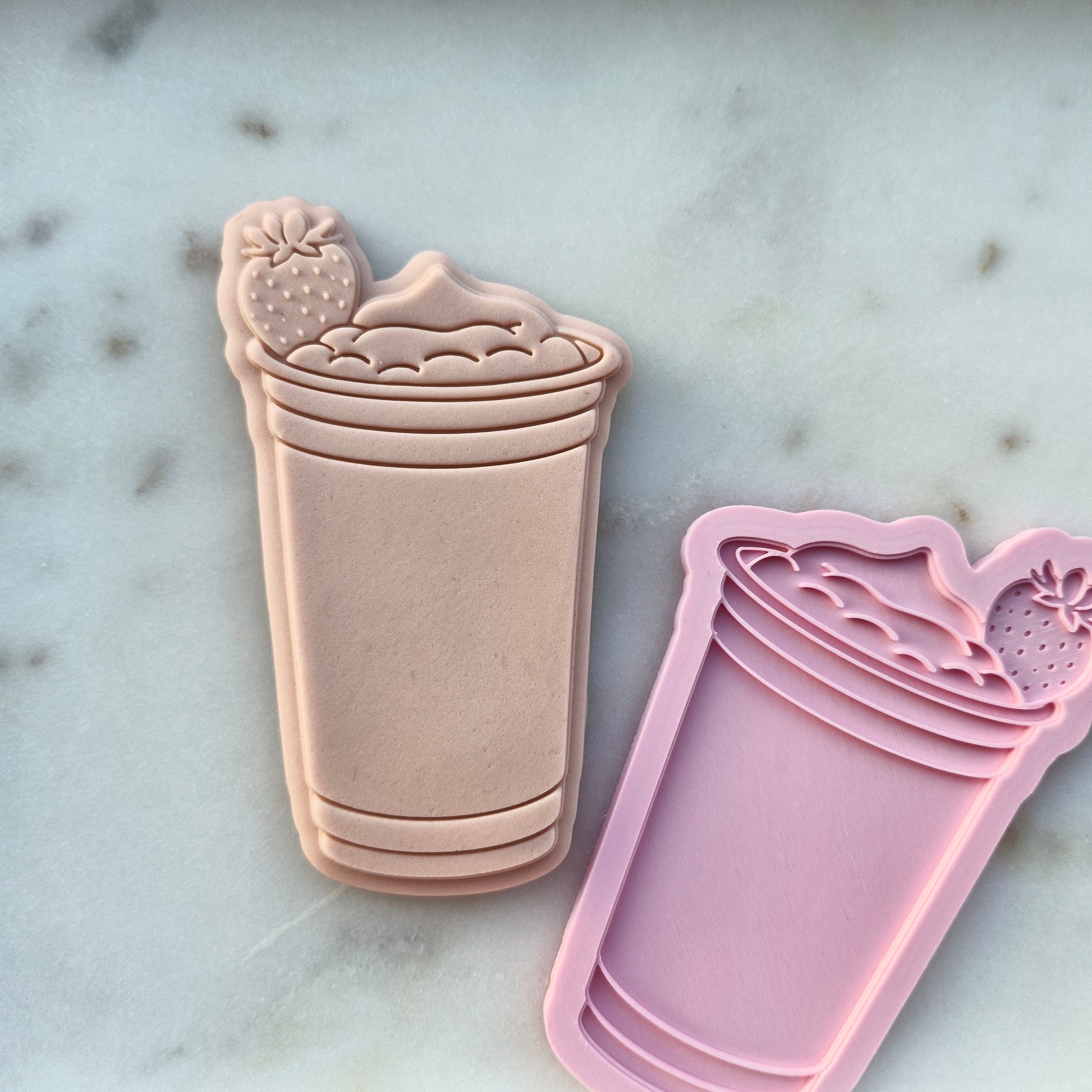 Strawberry Drink Cookie cutter and Stamp zoomed out on white marble stone