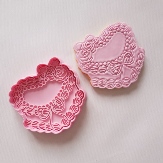 sugar cookie and cookie cutter with stamp, of the design of a vintage heart cake with bow and rose Vintage Heart Cake Cookie Cutter and Stamp